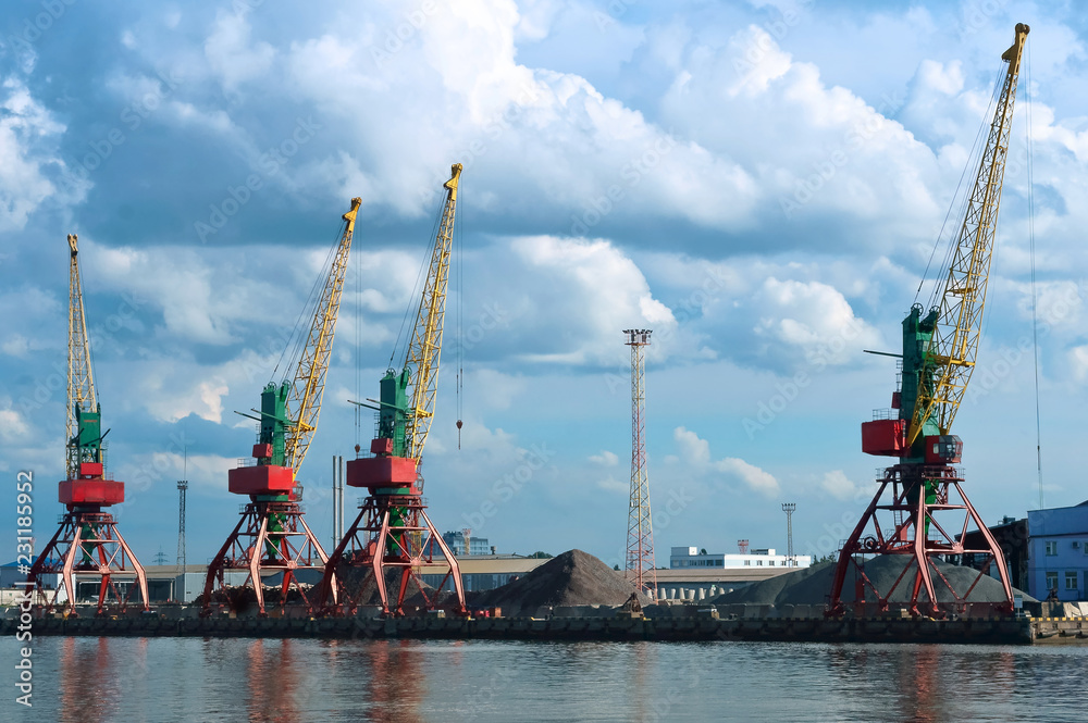 Seaport on the Baltic sea. Сommercial port. Port cranes and machinery. Russian port on the Baltic sea Kaliningrad.