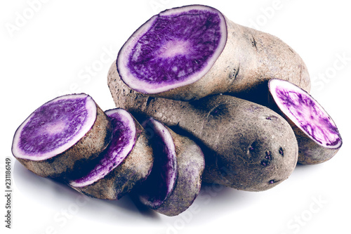 Vitolette noir or purple potato. On a white background. photo