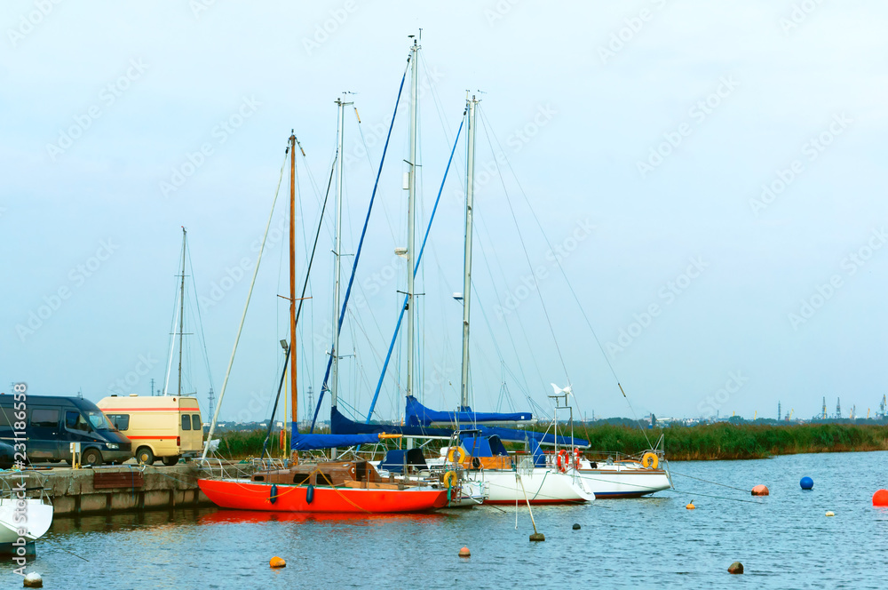 Boats at the pier. Boats on the water. Boats at the pier. Boats on the water.