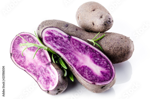 Vitolette noir or purple potato. On a white background. photo