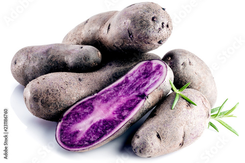 Vitolette noir or purple potato. On a white background. photo