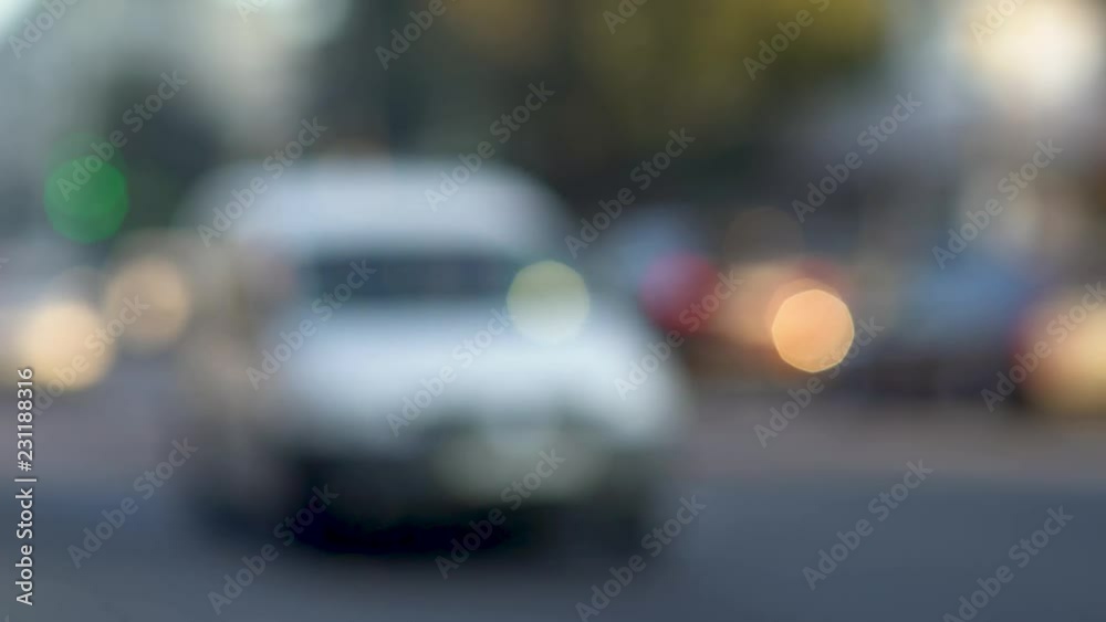 Blurred cars drive on the road. Blurred cars drive on the road.