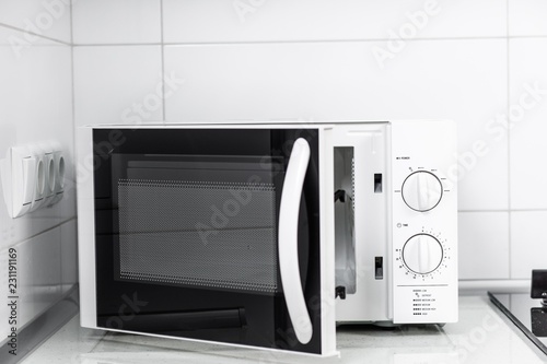 Modern kitchen interior with electric and microwave oven