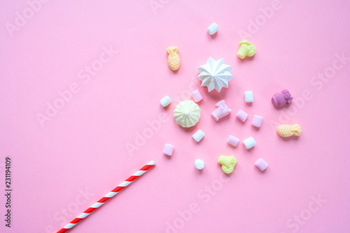 magic wand with pastel food on pink background photo