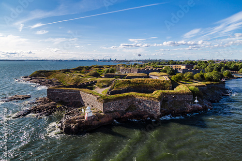 Suomenlinna fortress outside Helsinki, with city in the background, Finland photo