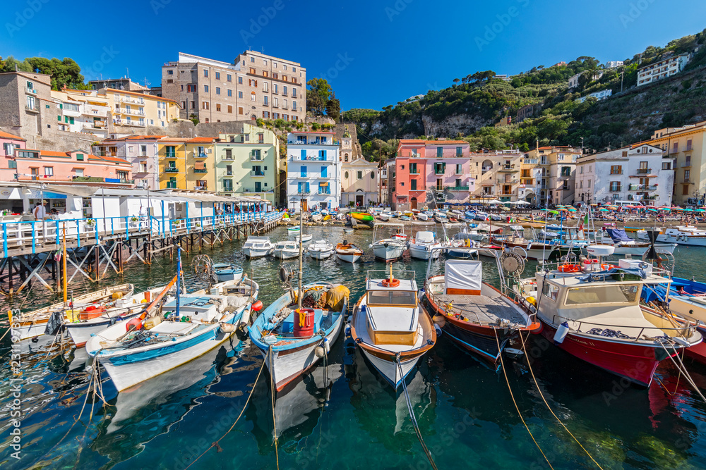 Small fishing boats at harbor Marina Grande in Sorrento, Campania, Amalfi Coast, Italy.