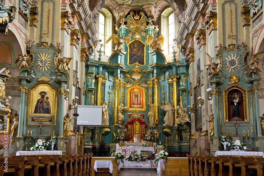The interior of a Catholic church without parishioners