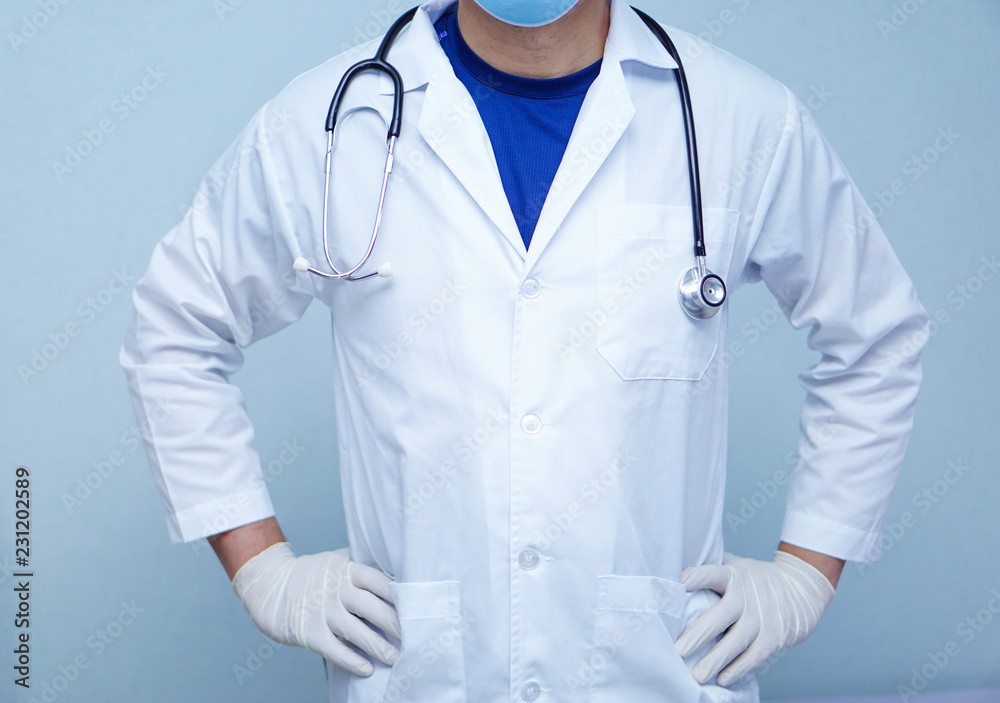 Doctor using stethoscope to checking the patient lie down on a bed in the hospital ward : healthy strong medical concept Doctor using stethoscope to checking the patient lie down on a bed in the hospital ward : healthy strong medical concept