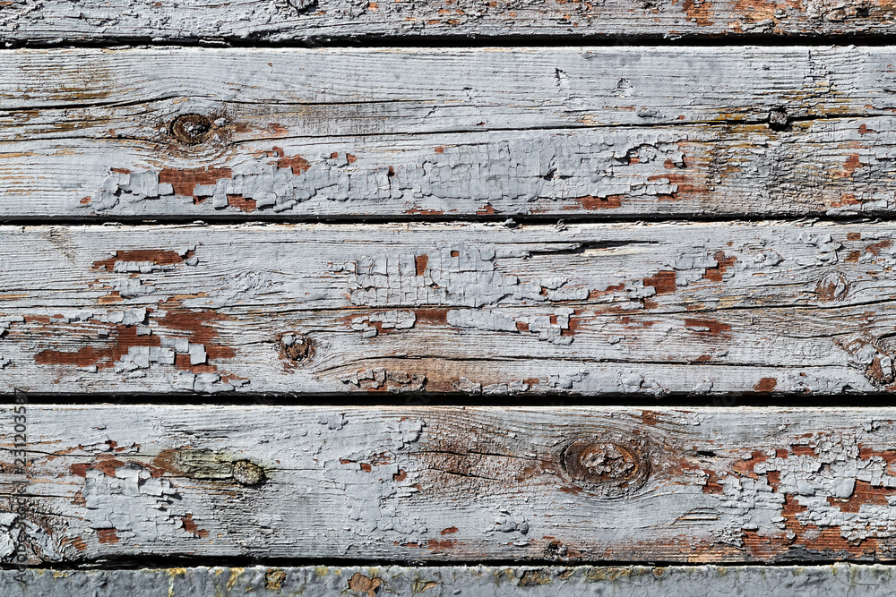 Rustic wood texture with cracked paint natural patterns surface as background Rustic wood texture with cracked paint natural patterns surface as background