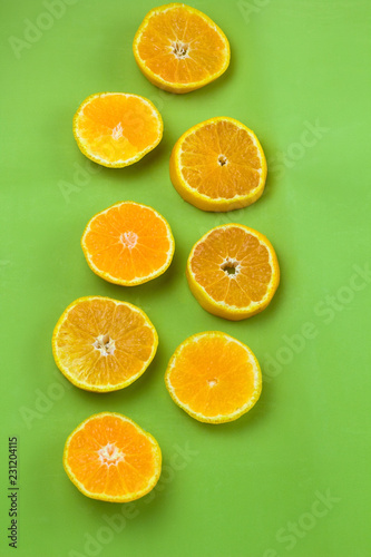 top view citrus slices flat lay green backgroun
