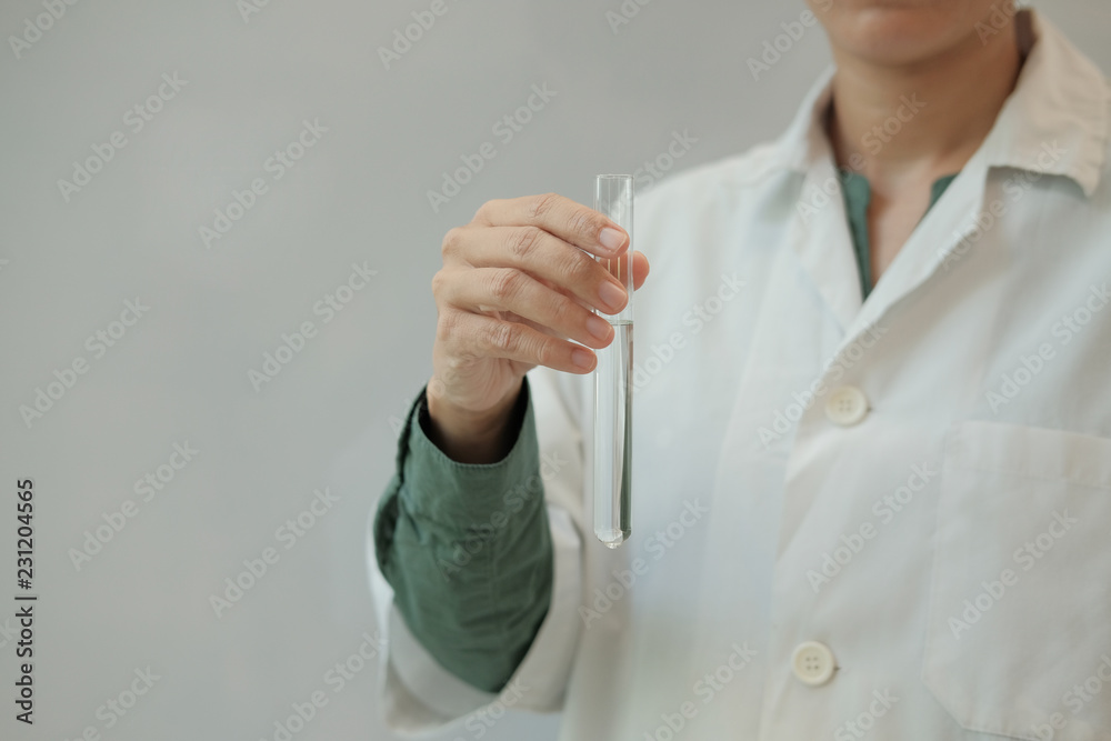 scientist working with test tube. researcher doing research investigation. chemistry biology science scientist working with test tube. researcher doing research investigation. chemistry biology science
