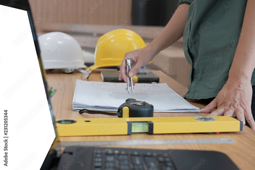 architect engineer working on house blueprint of real estate project at workplace. building construction concept architect engineer working on house blueprint of real estate project at workplace. building construction concept