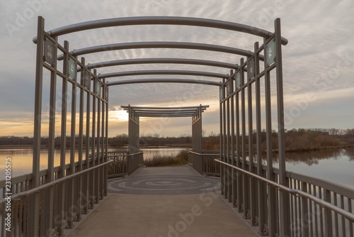 Bridge at sunset on the boardwalk over Purgatory Creek