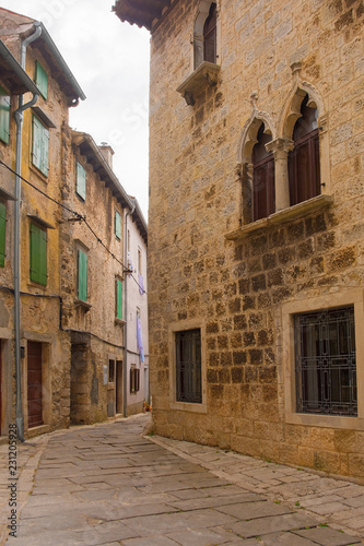 A street in the historic village of Vodnjan (also called Dignano) in Istria, Croatia   © dragoncello
