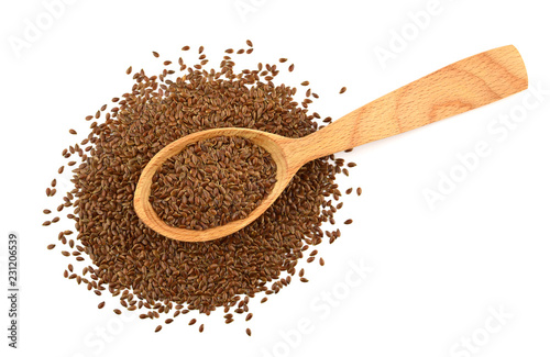 Isolated Flax Seed Heap with Spoon (Flaxseed, Linseed).