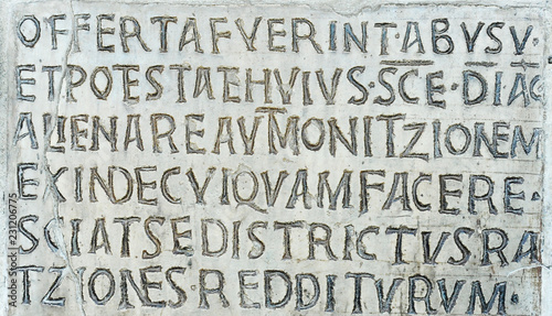 Latin inscription on ancient wall of Church of Santa Maria in Cosmedin in Rome, Italy