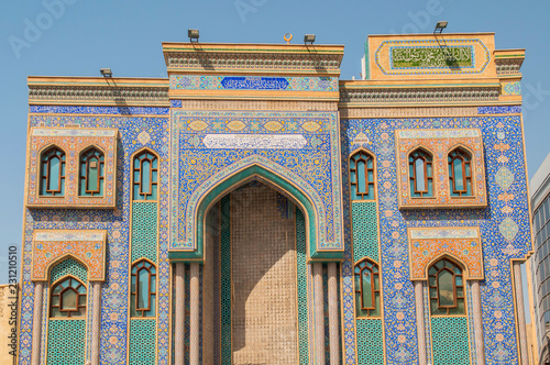 Facade with mosaic tilework of Ali bin Abi Talib Iranian Shia Mosque in Bur Dubai, the old city, United Arab Emirates. photo