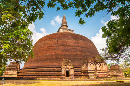 The front of the Rankoth Vehera, the largest Buddhist stupa at the ruins of the ancient kingdom capitol of Polonnaruwa, Sri Lanka. photo