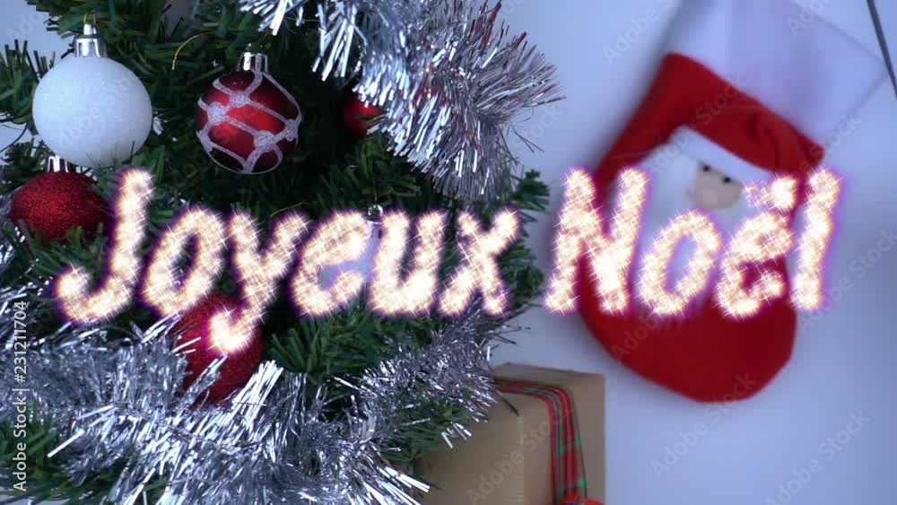 Christmas concept in super slow motion with text announcement joyeux noel