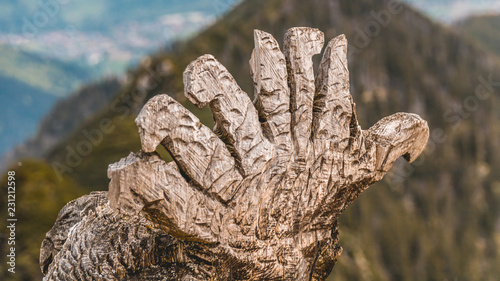 Closeup of a statue on the Hochfelln summit photo