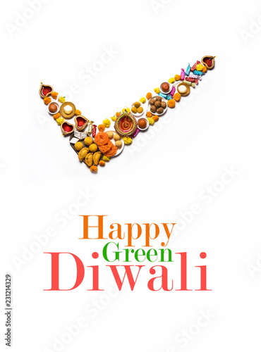 Celebrate Green or Eco friendly Diwali concept showing food and diya arranged in a tick mark shape 