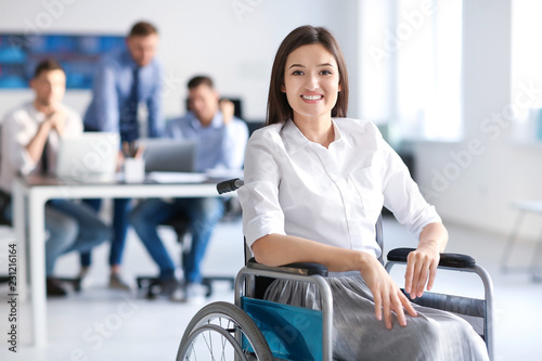 Young woman in wheelchair a...