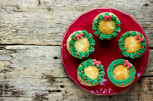 Christmas wreath cupcakes -  beautiful and delicious homemade cupcakes decorated with green cream and candy sprinkles, Christmas and New Year dessert