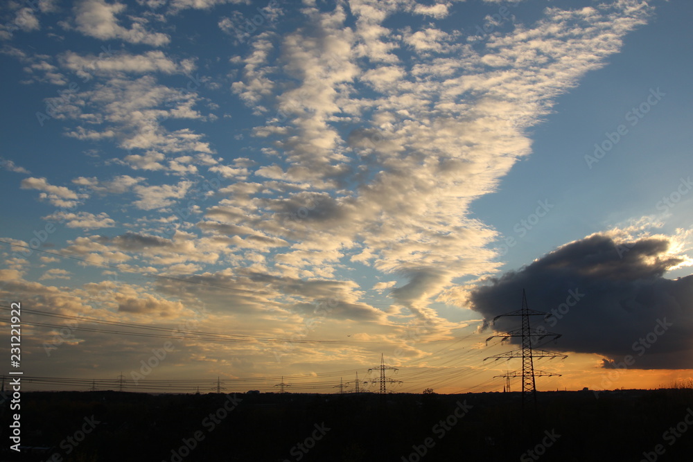 Wolken und Sonne