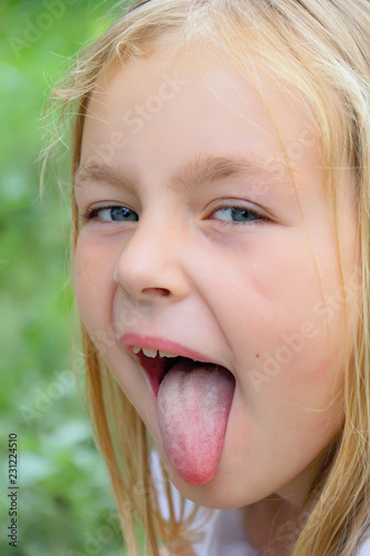 Girl makes faces