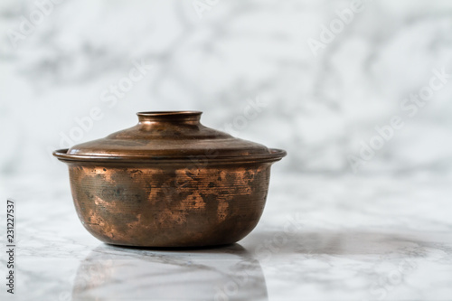 Authentic Handmade Turkish Copper Pan on White Marble Background