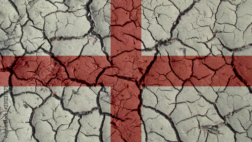 Political Crisis Or Environmental Concept: Mud Cracks With England Flag