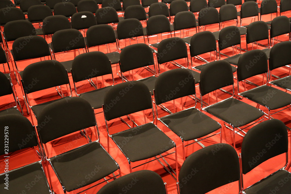 Fototapeta premium Free chairs in row in an empty auditorium