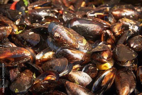 Fototapeta Naklejka Na Ścianę i Meble -  Boiled mussels with herbs and sweet pepper