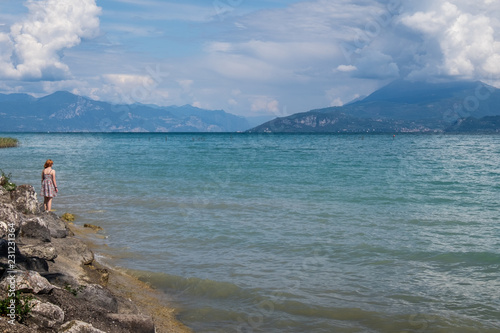 Girl on the shores of Lake Garda