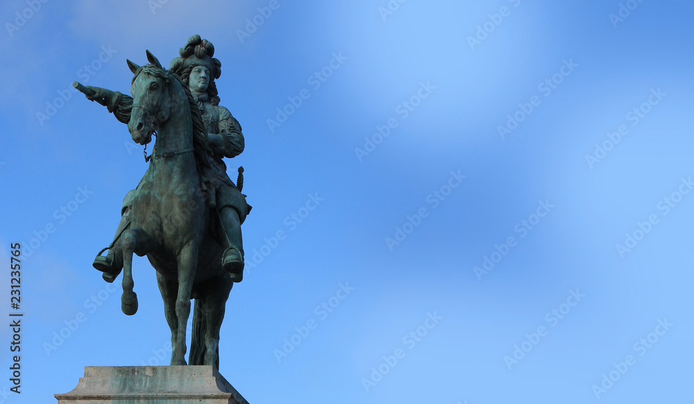 Statue of Louis 14 on the background of blue sky. Statue of Louis 14 on the background of blue sky.