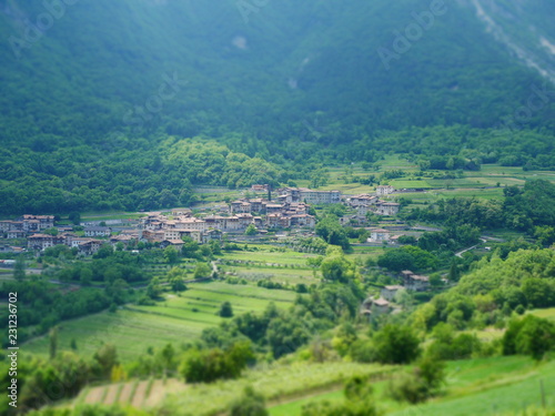 Tilt shift image of mountain village in italy