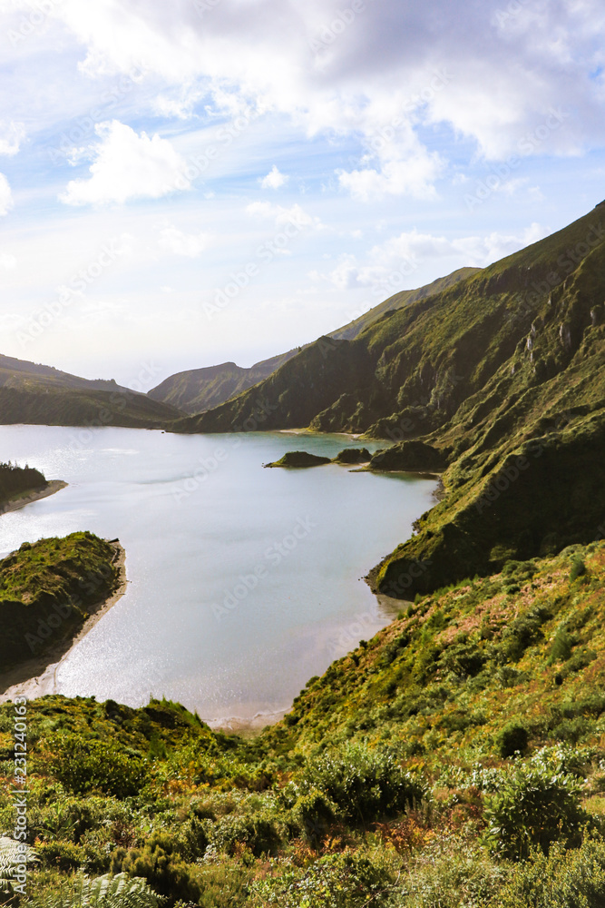 Amazing lagoon surrounded by mountains. ancient crater of a volcano. Fire Lagoon Azores island Portugal