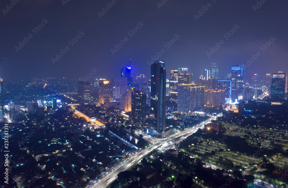 Jakarta skyline with high buildings at night