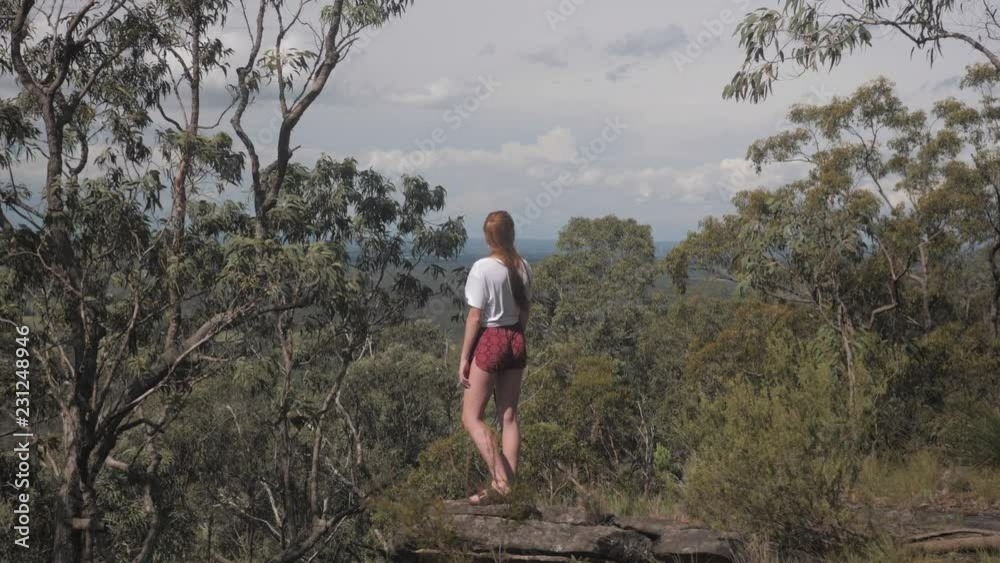 Young Woman Standing on Forest Cliff, Blue Mountains Australia. Young Woman Disc Young Woman Standing on Forest Cliff, Blue Mountains Australia. Young Woman Disc