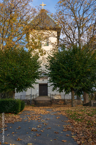 Backa kyrka or backa church with autumn trees