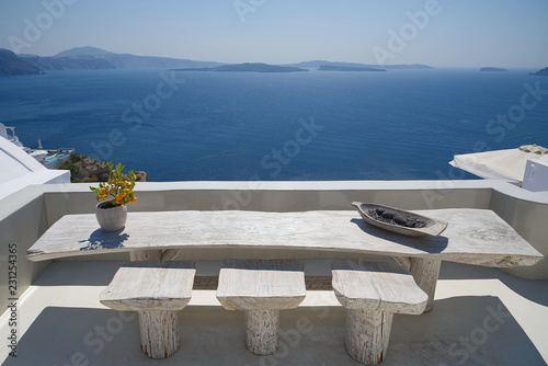 Terrace with table on the sea ( Oia ) - Santorini Island - Aegean sea - Greece © claudio968
