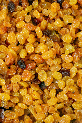 Closeup of golden raisins.
