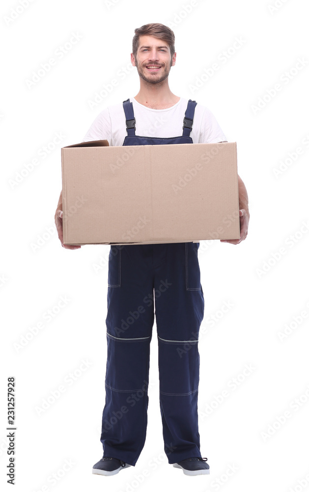 man in a jumpsuit holding a large box man in a jumpsuit holding a large box