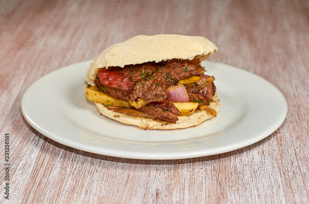 homemade meat sandwich, lomo saltado