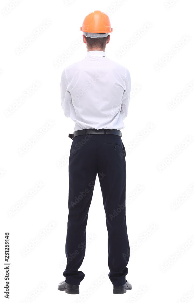rear view.successful business man in a protective helmet. rear view.successful business man in a protective helmet.