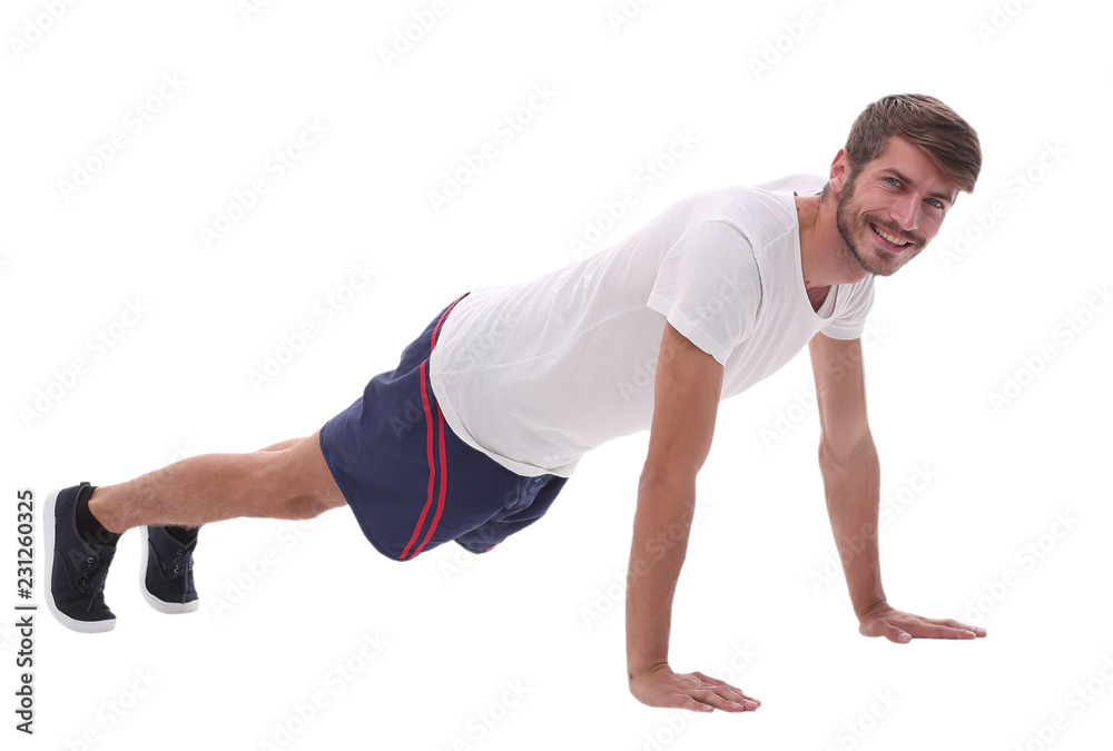 in full growth. a man performs a push-up from the floor in full growth. a man performs a push-up from the floor