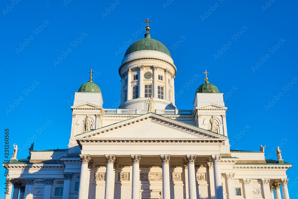 Helsinki cathedral in day light against a blue sky.