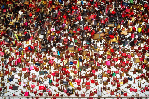 Love locks at Makartsteg Bridge. Great number of colorful love padlocks on a bridge in Salzburg, Austria