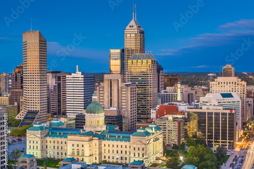 Indianapolis, Indiana, USA downtown city skyline with the State House at dusk. photo