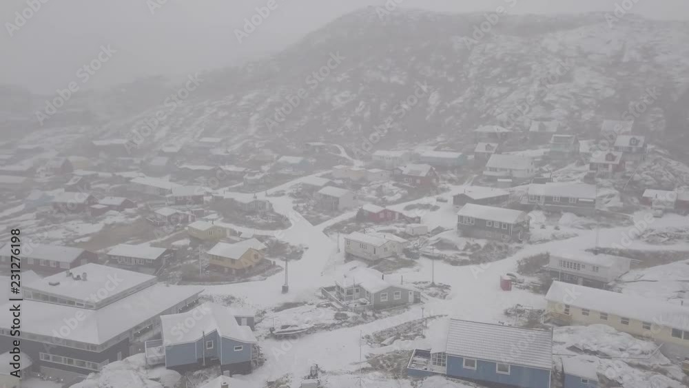 Snowing over the town, Qaqortoq Greenland.White town in the world 4k Snowing over the town, Qaqortoq Greenland.White town in the world 4k